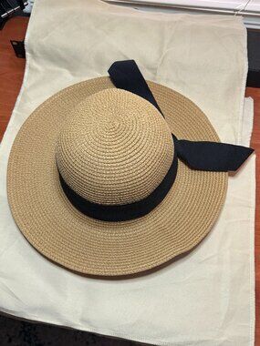 Furtalk women's beige straw sun hat with a black ribbon bow